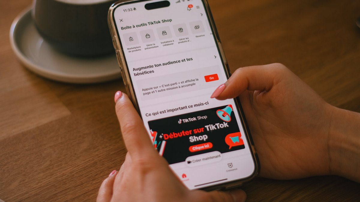 A person using the TikTok Shop app on a phone
