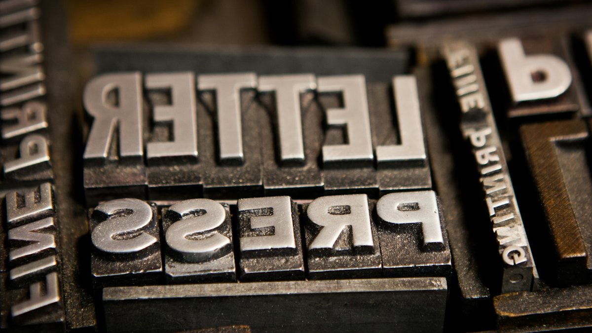 Metal letterpress type spelling the word letterpress